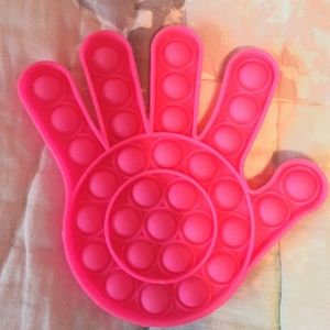 Hot pink hand pop it